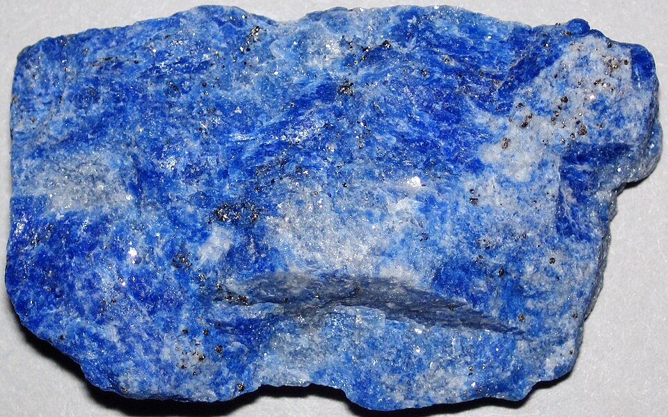 Rough lapis lazuli with white calcite veins and fine golden pyrite flecks, from Sar-e-Sang, Badakhshan